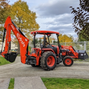 This is our new Kubota M62 Tractor Loader Backhoe. The M62 comes equipped with a 63 horsepower diesel engine, a front loader with 3,960 pounds of lift capacity, and a powerful backhoe, which will help with so many projects here at the farm.
