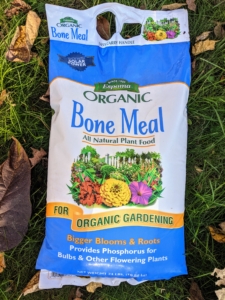 We also add Bone Meal fertilizer - a meal or powder made from ground up animal bones. It is used to increase phosphorus in the garden, which is essential for plants to flower.
