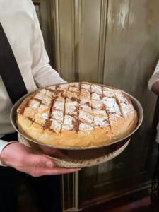 Here is one Bisteeya pie as it is carried into the dining room.