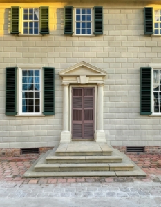 And here is the West Front entrance to Mount Vernon. Look closely at the lack of symmetry. Washington reused the original four room house as the core of the expansion.