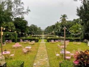 Here are some of the tables and chairs displayed in a "Rosé Paradis Garden" where guests can indulge in lavish menu items and toast to good times with the featured Whispering Angel rose.