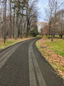 I love how the roads look after they are done. I built these carriage roads this way because they provide the best footing for my horses. It takes a bit of time to power rake and "drag" the four-miles of carriage road, but they all look so well-groomed once it is completed.
