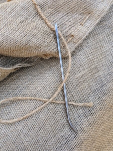 All the sewing is done using five-inch or eight-inch long craft needles specifically made for working with jute – every member of the outdoor grounds crew has his own needle. These needles have large eyes and bent tips.