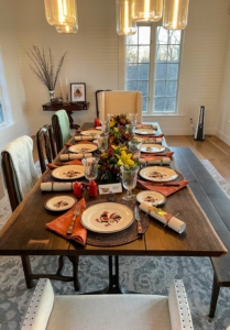 Our CEO, Neil Fiske and his wife, Sonya, enjoyed a wonderful holiday at their home with family and friends. Sonya says they always use her grandmother's vintage Metlox Red Rooster dinnerware for the table setting.