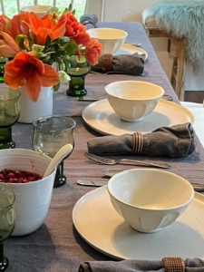 Their table was decorated in white, gray, and fall shades of orange.