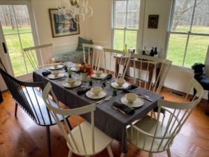 This is the home of Christian Martin, President of Marquee Media. He and his family hosted a gathering for eight in Sharon, Connecticut.