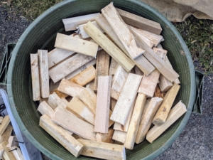 Even scraps of wood can be repurposed for various projects. Here, we cut long wooden stakes into small strips. The strips are about six to eight inches long – just long enough to accommodate two screws that will keep the burlap in place.