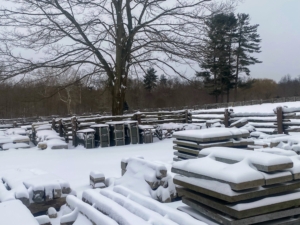 Here is my newly organized stone yard - also covered in white. This is where extra inventory of the many types of stones used at the farm are kept - slate shingles, marble flooring, granite posts, etc.