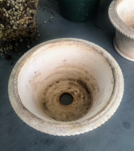 Each pot has a drainage hole. A clay shard is placed over the hole to help prevent any soil from falling out and to aid with drainage. I also like to use clay pots because they allow proper aeration and moisture to penetrate through the sides and to the plant.