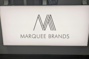 Our offices are new and bright and very inviting. It is refreshing to be able to return to our safe corporate environment, and to see colleagues after all this time. Our partner, Marquee Brands, is a leading global brand managing and marketing entity. It was founded in 2014 and is sponsored by well-known investment corporation, Neuberger Berman.