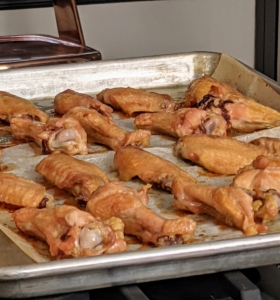 I also cooked about three pounds of chicken in the oven for our wings recipes. As a general rule, when making wings, allot for about six wings per person, and up to 12 per person if it's a main dish.