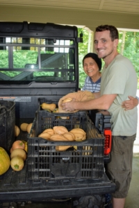 Here she is with my head gardener, Ryan McCallister after a big harvest of squash.