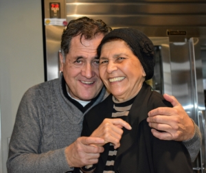 Laura and Carlos stop for this sweet photo during her retirement party in December 2018.