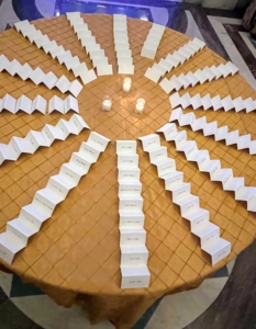 Place cards were displayed on a large round table.