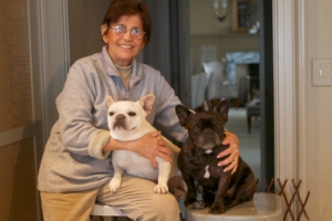 Laura loved my dogs. Here she is with Francesca and Sharkey. She groomed them, walked them, and kept them out of trouble.