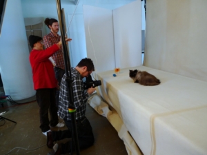 Laura was a big help with magazine shoots. Here she is in 2011 getting Bartok's attention for the camera.