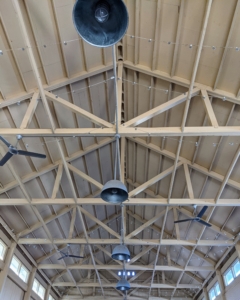 The Equipment Barn is well lit with these big overhead lamps. I use very utilitarian lighting and fans where I can on the farm.