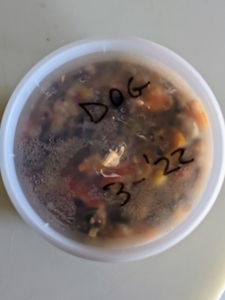 Each lid is marked with the contents and the date it was prepared.