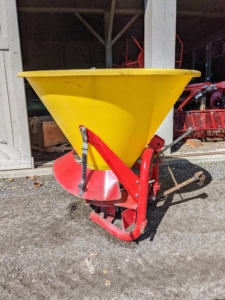 This is a 3-point spreader, which can be attached to a variety of tractors to spread fertilizer or seed. This is great for spreading seed in our paddocks and in the hayfields.