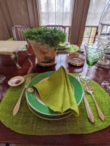 Here is a closer look at one of the place settings. My housekeeper, Enma, and I, always work together to create the most inviting table settings. I also used some plants from my greenhouse for the centerpiece. This is a potted selaginella, sometimes referred to as a spike moss or arborvitae fern.