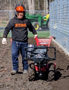 A couple of weeks ago, Phurba started rototilling the vegetable garden in preparation for our spring planting - we caught him wearing one of STIHL's black hooded sweatshirts.