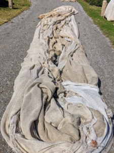 We use industrial burlap that’s available in giant rolls of 40-inches or 60-inches wide. These covers are used for two or three seasons before being replaced.