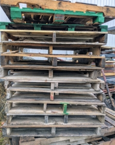 We also save wooden pallets. These are good for keeping things off the ground when storing. They are also good for transporting items and carrying them with our fork lift.