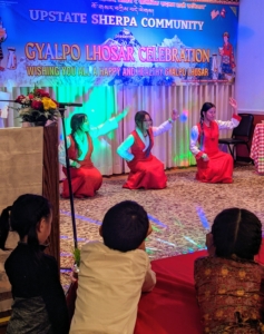 Children of all ages also performed. Here, the daughters of Pasang and Sanu danced for the audience while younger children watched.