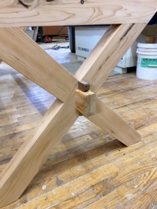 And this is one base after the cross piece was secured to the trestles. By definition, a trestle is a a framework consisting of a horizontal beam supported by two pairs of sloping legs, used in pairs to hold up a flat surface such as a tabletop.