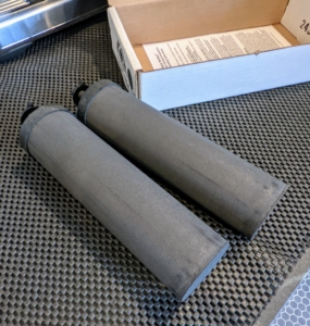 Here are two new replacement black filters. Because of the effects that water deposits and contaminants have on the unit, it is recommend that these be changed every six months or as filtration speed slows.
