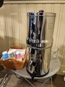 The smaller Royal Berkey system holds 3.25 gallons of water and stands about 20-inches tall when fully configured – perfect for smaller families up to four. I keep this one in my gym.