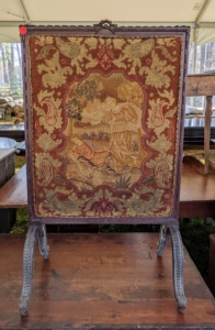 An antique needlework fireplace screen... for sale!