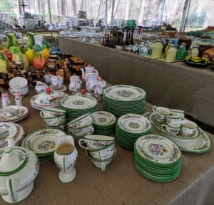 Tables and tables filled with dishes - some sets, some individual collectibles. Bowls, plates, platters, cups, saucers - in so many different patterns. Anyone who loves china will love this section of the tent.