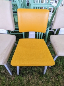 And a contemporary style yellow chair... for sale!