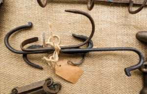 Antique cast iron hooks... for sale!
