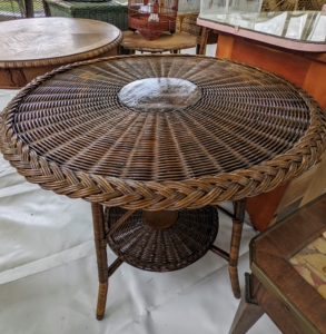 A round wicker table... for sale!