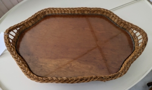 A rattan and wood serving tray... for sale!