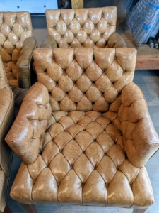 Tufted leather club chairs... for sale!