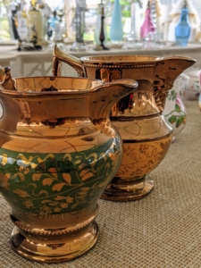 Lustreware in its earliest development was made throughout the Middle East. The name “lustreware” comes from the iridescent or luminous effect created on glazed ceramics which, following the initial firing, are taken through further treatment with metal oxides. Traditionally, copper and silver oxides were used, but the range also included gold, platinum, and bismuth.