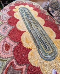 This fun hooked rug was also for sale.