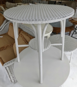 A white wicker table... for sale!