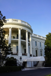 This is The South Portico of the White House. It was constructed by James Hoban in 1824 during the presidency of James Monroe. In 1948, President Harry S. Truman added the Truman Balcony to the second floor, a private porch enjoyed by First Families ever since.