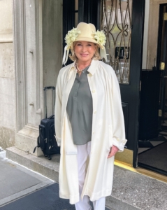 Here I am in my “hat luncheon” ensemble. I always embellish one of my own hats for the affair. This year, I decorated my hat with many fresh daffodils from my gardens.