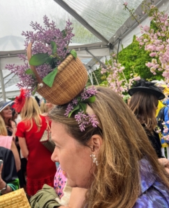 Everyone wore hats of all sizes and shapes adorned with all kinds of embellishments. Here is one that caught my eye - a basket of spring flowers.