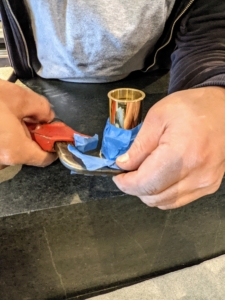 The base of the shank being installed was covered with blue painting tape to protect it from scratches. It's also a good idea to cover the wrench with tape, so there is an added layer of protection.