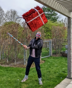 After our remarks, Baccarat North America President and CEO, Jim Shreve, tried his hand at opening one of the piñatas... blind folded of course.