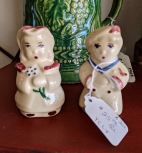 These are vintage salt and pepper shakers.
