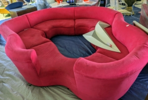 And here's a unique sofa... bright red and with no ends. Is it in the shape of lips?