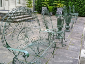 This year, I placed metal green garden furniture on the terrace, so guests can sit, relax, and enjoy all the beautiful plantings in this garden.