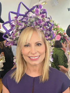 This is philanthropist and Central Park Conservancy Trustee Gillian Miniter in her spring purple headpiece.